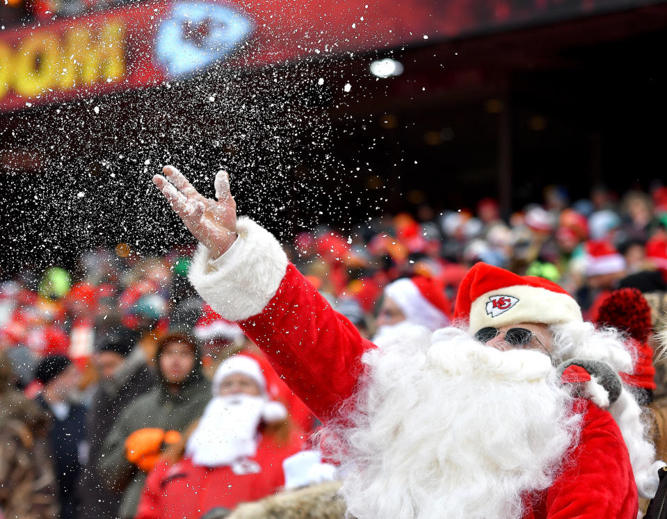 Santa Claus (Mitch Peters from Fayette, Mo.) spreads the Christmas Eve snow around during Sunday's football game between the Kansas City Chiefs and Miami Dolphins Dec. 24, 2017 at Arrowhead Stadium in Kansas City, Mo. The Chiefs won, 29-13. (John Sleezer/Kansas City Star/Tribune News Service via Getty Images)