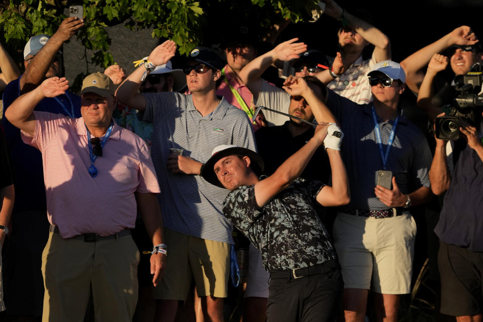 Joel Dahmen watches his shot on the 18th hole during the second round of the U.S. Open golf tournament at The Country Club, Friday, June 17, 2022, in Brookline, Mass. (AP Photo/Robert F. Bukaty)