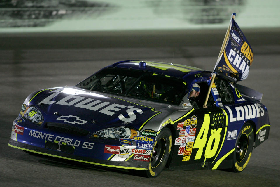 Jimmie Johnson, driver of the #48 Lowe's Chevrolet, celebrates clinching the NASCAR Nextel Cup Series Championship following the Ford 400 at Homestead-Miami Speedway on November 18, 2007 in Homestead, Florida. (Photo by Todd Warshaw/Getty Images for NASCAR)