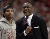 Toronto Raptors head coach Dwane Casey, right, and rapper Drake react near the end of a loss to the Brooklyn Nets in Game 7 of the opening-round NBA basketball playoff series in Toronto, Sunday, May 4, 2014. (AP Photo/The Canadian Press, Frank Gunn)