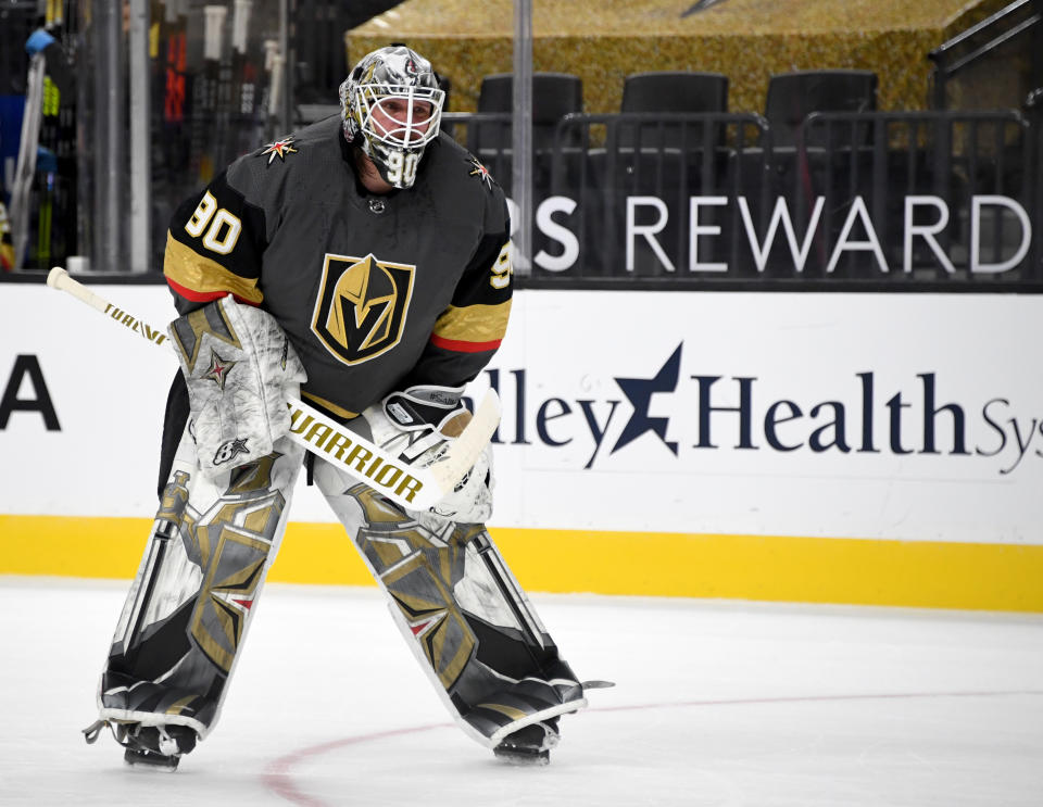 LAS VEGAS, NEVADA - JANUARY 14:  Robin Lehner #90 of the Vegas Golden Knights takes a break during a stop in play in the first period of a game against the Anaheim Ducks at T-Mobile Arena on January 14, 2021 in Las Vegas, Nevada. The Golden Knights defeated the Ducks 5-2.  (Photo by Ethan Miller/Getty Images)