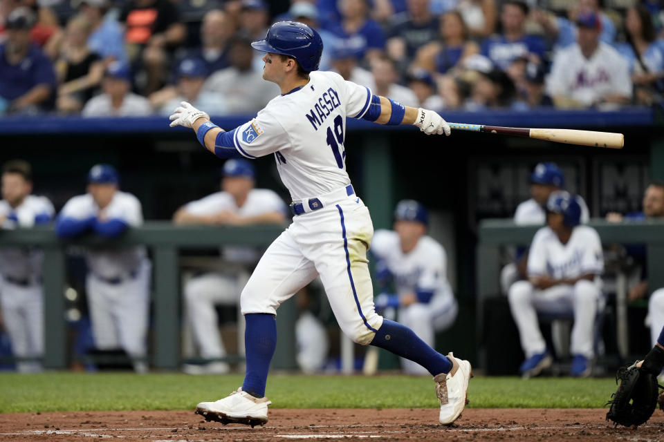 Kansas City Royals' Michael Massey hits a two-run double during the first inning of a baseball game against the New York Mets Wednesday, Aug. 2, 2023, in Kansas City, Mo. (AP Photo/Charlie Riedel)