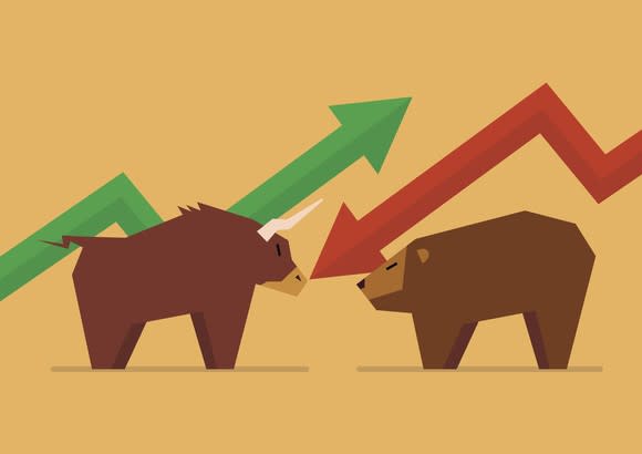 A bull and a bear with corresponding stock chart arrows behind them.