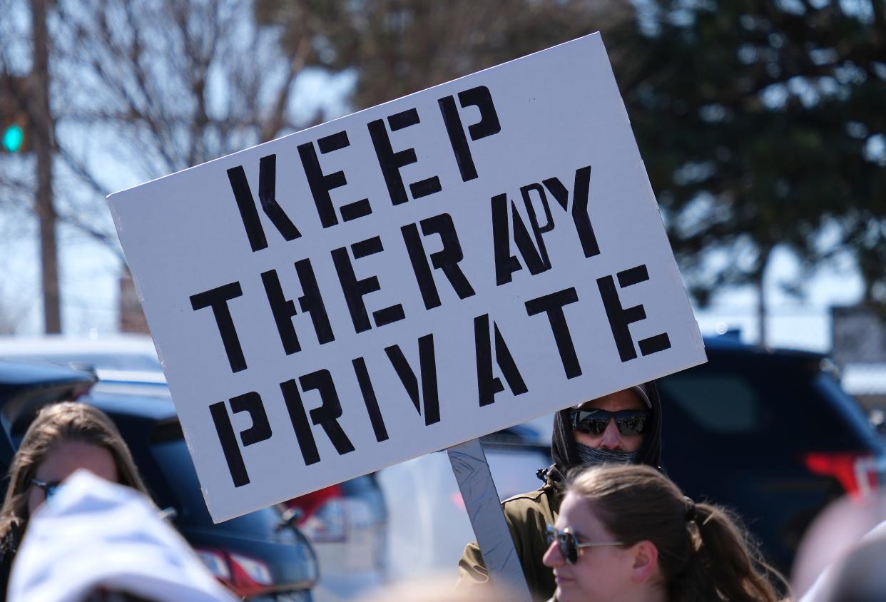 A sign is displayed Saturday, March 17, 2023, during a rally and walk to the Capitol by Oklahoma Providers for Privacy to remove mental health from the Health Information Exchange mandate.