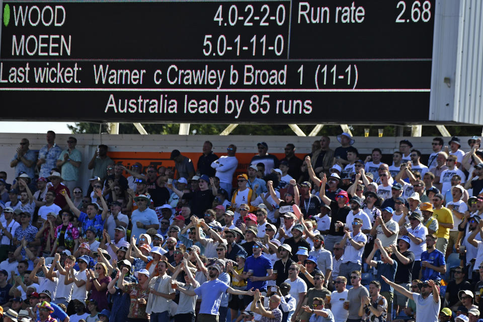 Spectators cheer for the players as they watch the play on the second day of the third Ashes Test match between England and Australia at Headingley, Leeds, England, Friday, July 7, 2023. (AP Photo/Rui Vieira)