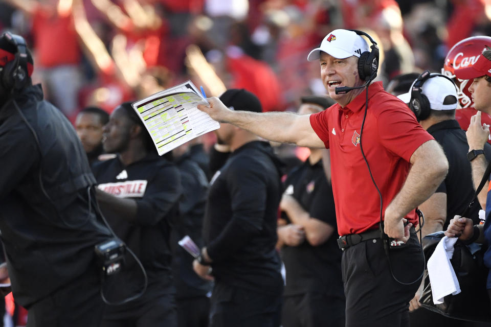 Louisville head coach Jeff Brohm shouts instructions to his team during the second half of an NCAA college football game against Boston College in Louisville, Ky., Saturday, Sept. 23, 2023. Louisville won 56-28. (AP Photo/Timothy D. Easley)