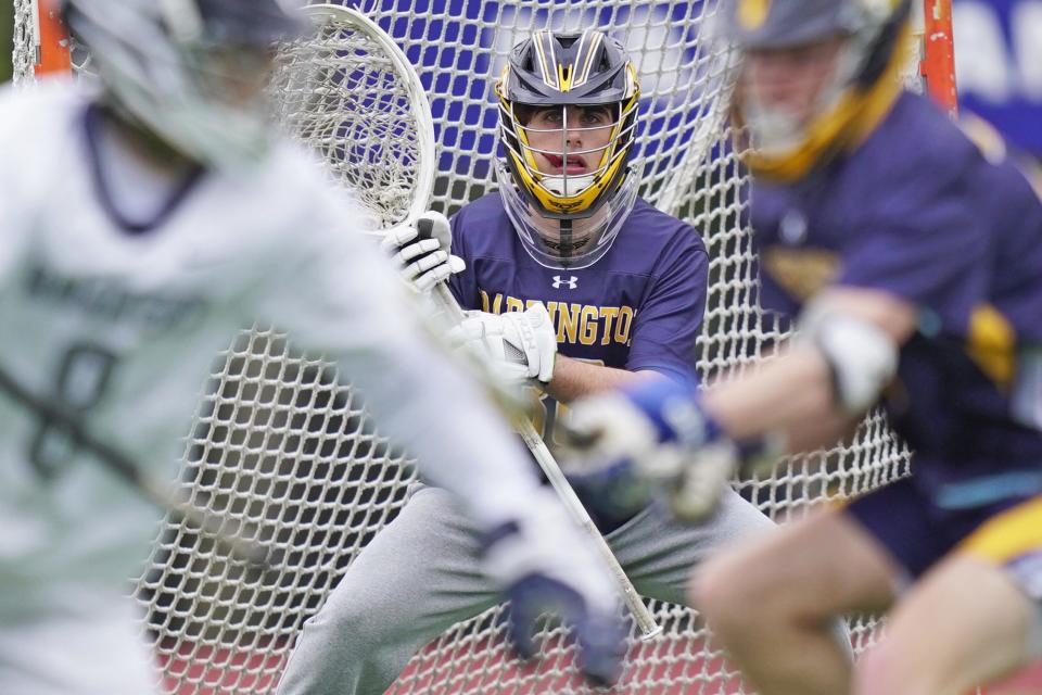 Barrington goalie Grant Isdale stays focused on the action ahead of him late in the second quarter of Friday's loss to Moses Brown.