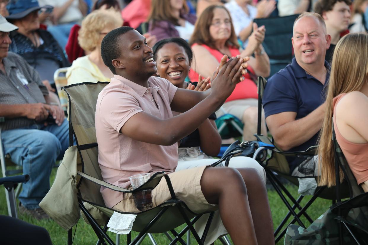 Attendees cheer at the Levitt Concert