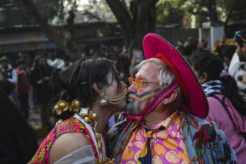 Two participants kiss each other as members of the LGBTQ community and their supporters march demanding equal marriage rights in New Delhi, India, Sunday, Jan.8 2023. The government is yet to legalize same-sex marriages in the country even though the Supreme Court in 2018 struck down a colonial-era law that made gay sex punishable by up to 10 years in prison. (AP Photo)