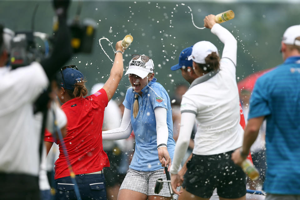 Jessica Korda of USA is splashed with water on the 18th hole after winning the Sime Daeby LPGA in the final round of the Sime Darby LPGA Tour at Kuala Lumpur Golf & Country Club on October 11, 2015 in Kuala Lumpur, Malaysia. (Photo by Stanley Chou/Getty Images)
