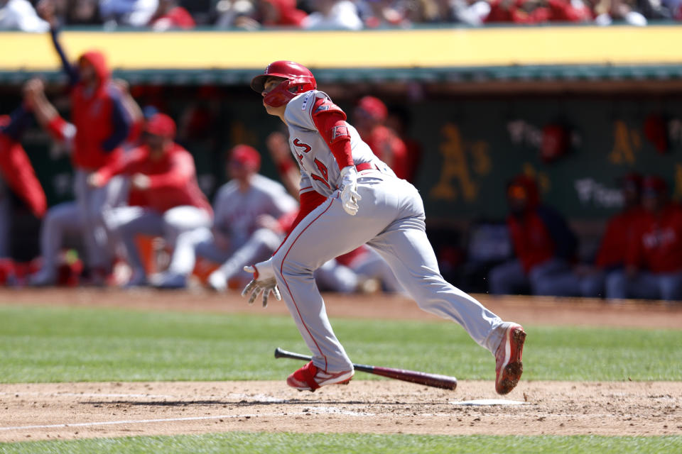 Los Angeles Angels' Logan O'Hoppe (14) watches his three-run home during the fourth inning of a baseball game against the Oakland Athletics in Oakland, Calif., Sunday, April 2, 2023. (AP Photo/Jed Jacobsohn)