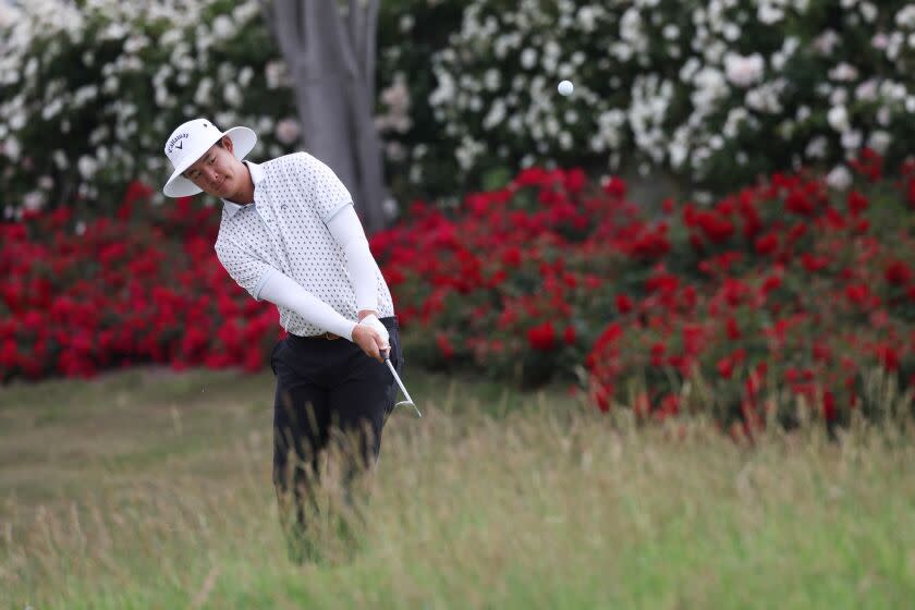 Alex Yang plays a shot during a practice round Tuesday to ready for the U.S. Open.