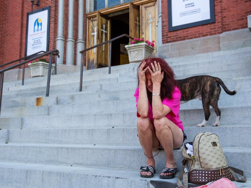 A mourner outside the church where Roberta Drury’s funeral was held (AP)