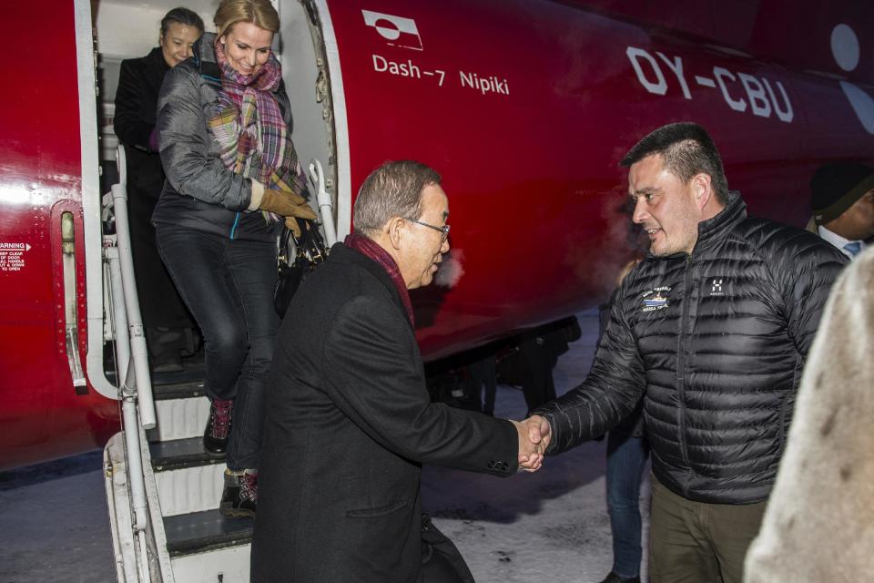 Denmark's Prime Minister Helle Thorning- Schmidt, second left, and U.N. Secretary General Ban Ki-moon, center, are welcomed by Greenland's Environment Minister Kim Kielsen, right, Tuesday, March 25. 2014 in Ilulissat in Greenland. The visit takes place in preparation for the U.N. Climate Summit on September this year in New York. (AP Photo/POLFOTO, Leiff Josefsen) DENMARK OUT