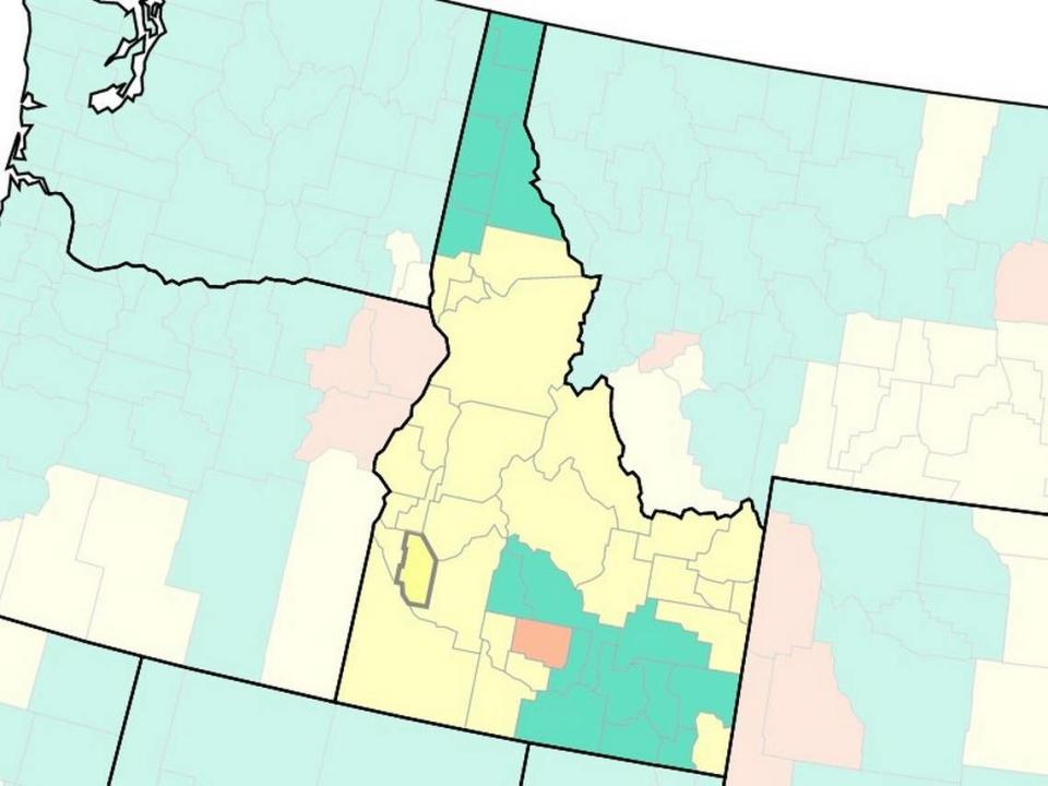 The CDC’s COVID-19 community-level map by county, posted Thursday. Green means low risk, yellow medium risk and red high risk. Ada County, in yellow, is marked with a thick border.