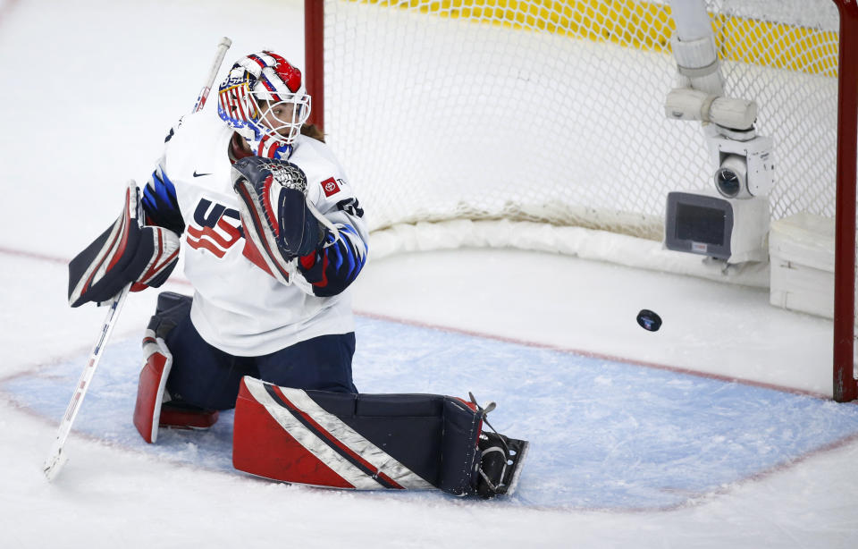 U.S. goalie Nicole Hensley looks back at the winning goal by Canada in overtime of the IIHF hockey women's world championships title game in Calgary, Alberta, Tuesday, Aug. 31, 2021. (Jeff McIntosh/The Canadian Press via AP)