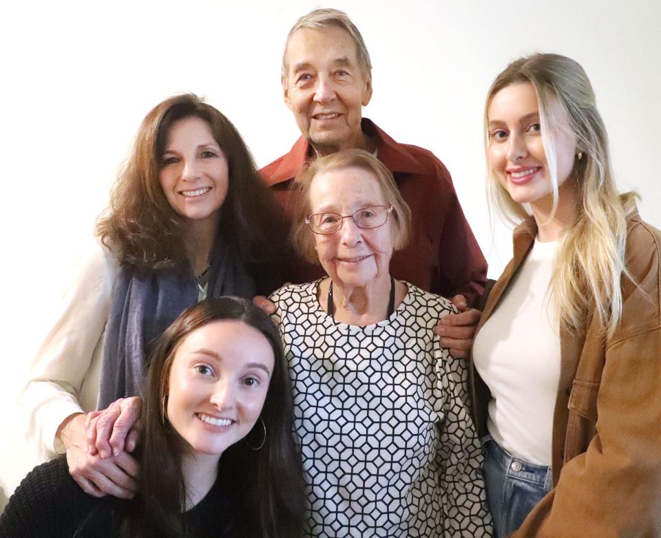 Lorene Amick, who will turn 103 years old on New Year's Eve, poses for a family picture with daughter Denise Demico, son Ken Love and granddaughters Anastasia Demico and Aleeta Demico in her apartment in Daytona Beach.