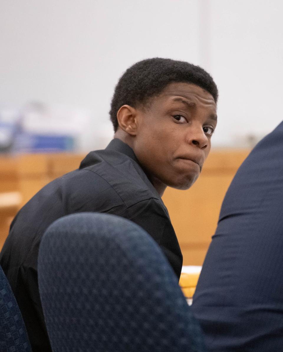 Tymetryon Knight, center, and his attorneys listen during his trial at the Escambia County Court House in Pensacola on Friday, Sept. 29, 2023.