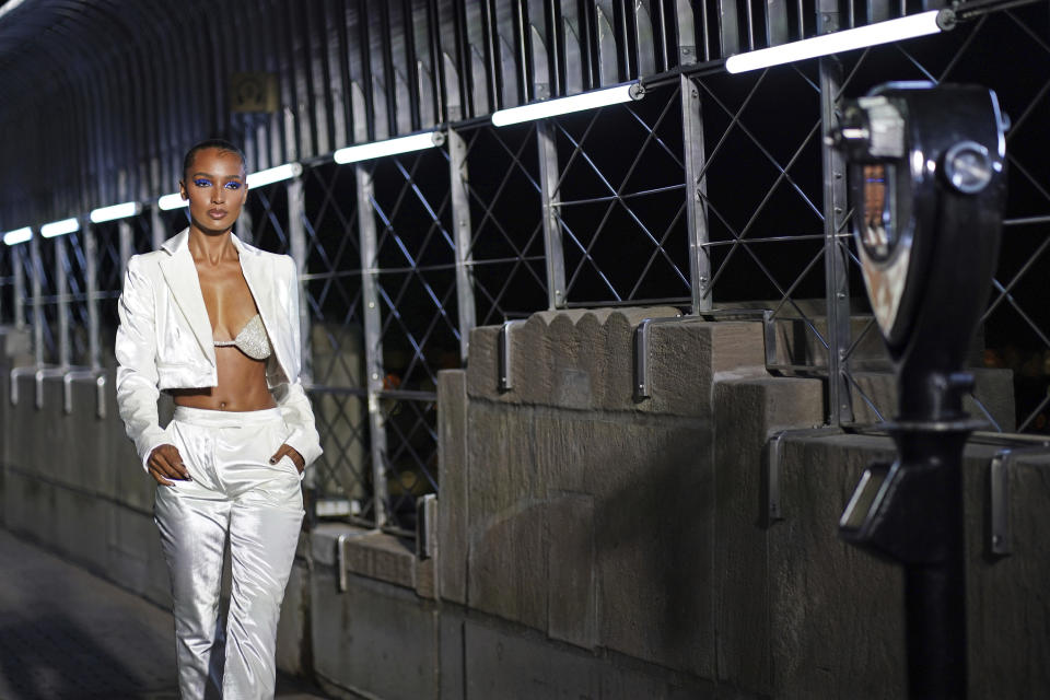 The LaQuan Smith collection is modeled at the Empire State Building during New York Fashion Week on Thursday, Sept. 9, 2021, in New York. (Photo by Charles Sykes/Invision/AP)