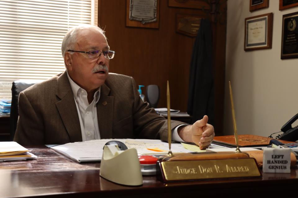 Oldham County Judge Don R. Allred. Allred has been county judge for nearly three decades. When COVID-19 hit his county, Allred tried to keep the town calm by squelching rumors and trying to explain procedures for handling the disease.