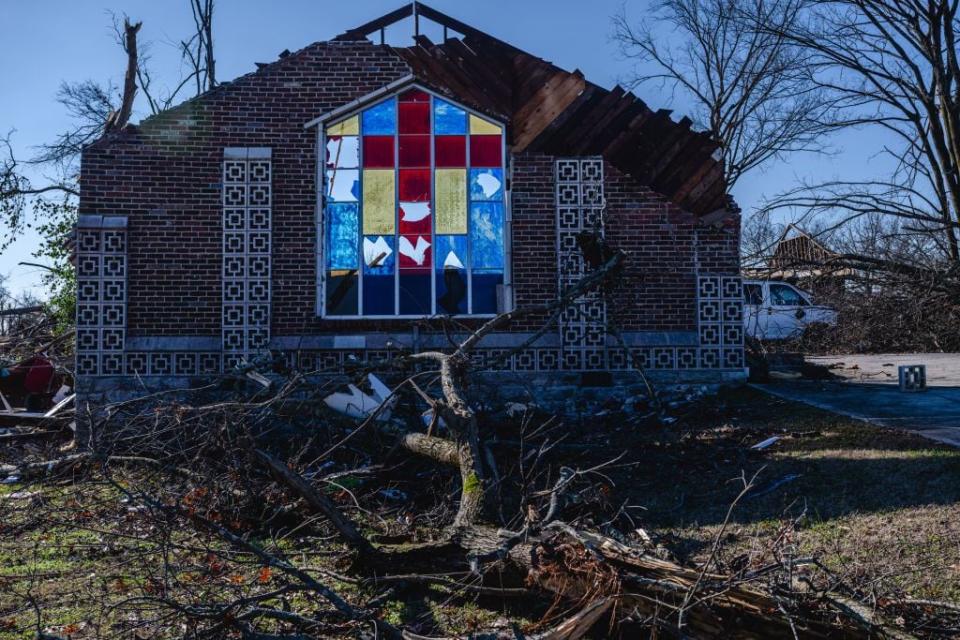 A single standing wall of the nave of Sabbath Day Church of God in Christ is seen in the aftermath of a tornado on Dec. 10, 2023, in Madison, Tennessee.