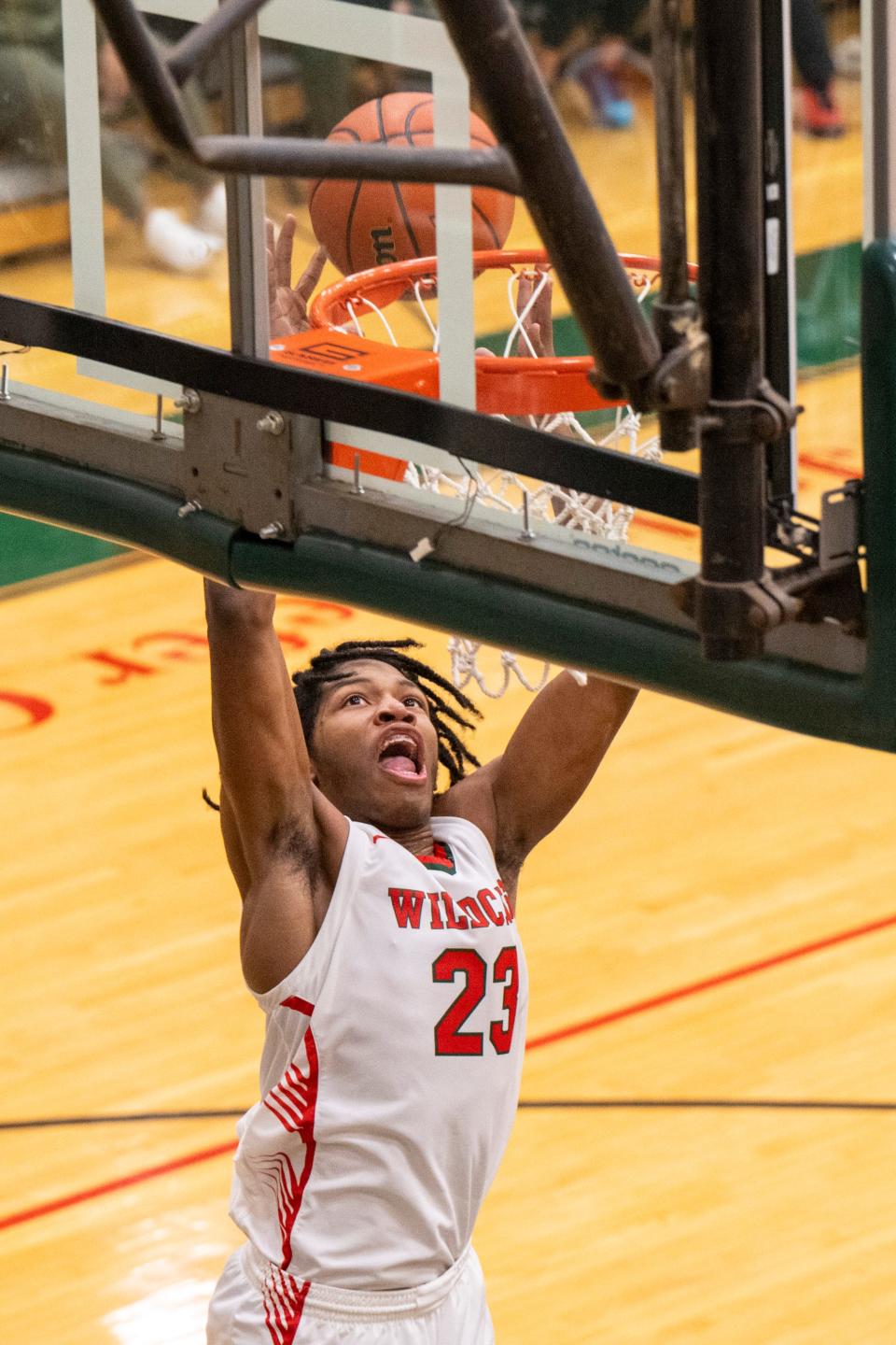 Lawrence North High School junior Azavier Robinson (23) shoots during the second half of an IHSAA Class 4A Boys’ Sectional basketball game against North Central High School, Wednesday, Feb. 28, 2024, at Lawrence North High School.