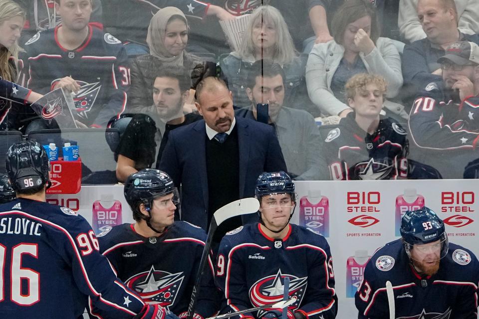 Oct 25, 2022; Columbus, Ohio, USA;  Columbus Blue Jackets head coach Brad Larsen reacts from the bench during the second period of the NHL hockey game against the Arizona Coyotes at Nationwide Arena. Mandatory Credit: Adam Cairns-The Columbus Dispatch