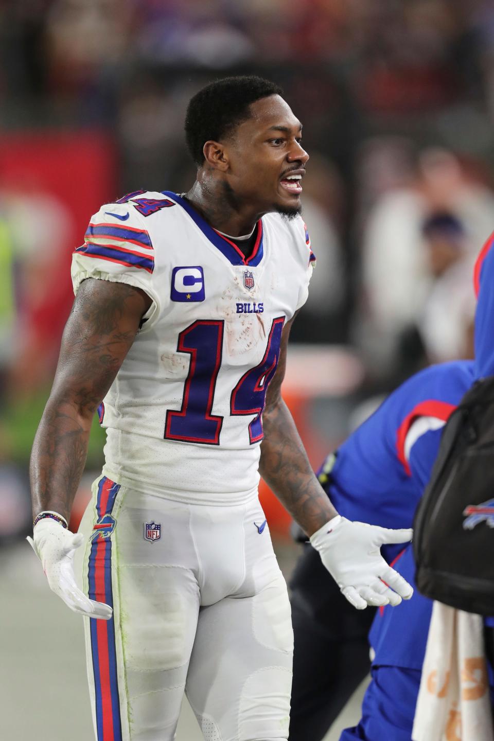 Buffalo Bills wide receiver Stefon Diggs (14) talks to teammates on the sideline during a NFL football game against the Tampa Bay Buccaneers, Sunday, Dec.12, 2021 in Tampa, Fla.