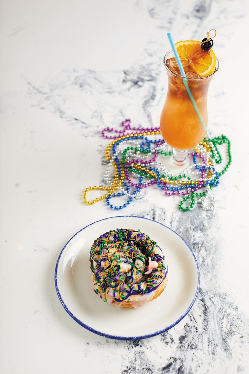 Mardi Gras treats: mini king cakes and Hurricane cocktails are among the Fat Tuesday-themed offerings at Lucky Shuck in Jupiter.