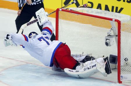 Russia's goaltender Sergei Bobrovski fails to save a goal of Canada's Claude Giroux (not seen) during their Ice Hockey World Championship final game at the O2 arena in Prague, Czech Republic May 17, 2015. REUTERS/Laszlo Balogh