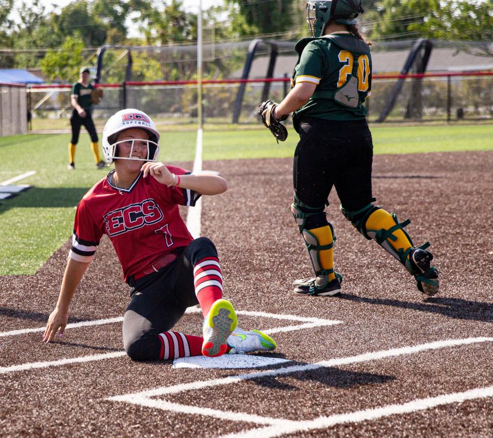 Kylie Shaw from Evangelical Christian School slides into home after hitting a homerun against Shorecrest Prep during a Class 2A Regional quarterfinal game at ECS on Wednesday, May 10, 2023. ECS won 16-0.