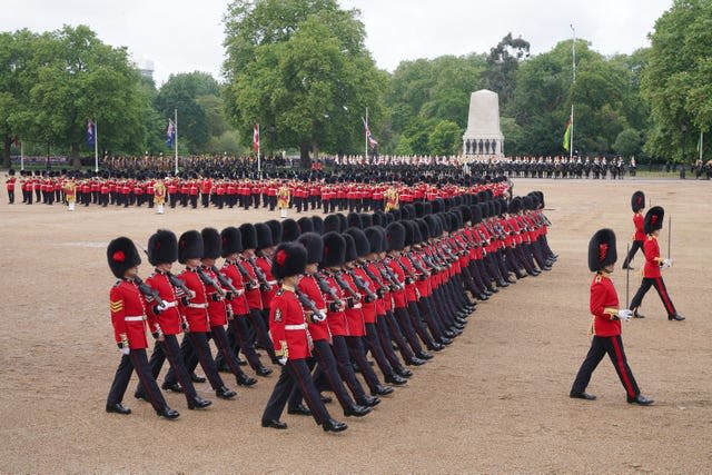 The Coldstream Guards march in formation during the Trooping the Colour ceremony
