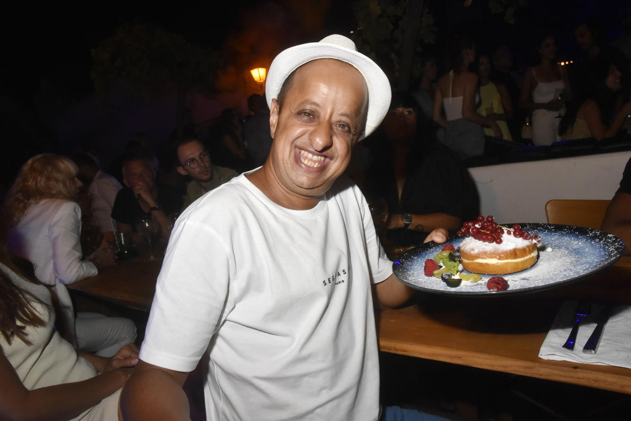 SAINT-TROPEZ, FRANCE - AUGUST 14: Comedian Booder aka Mohamed Benyamna celebrates his birthday  attend the VIP Room Saint Tropez Gioia Restaurant Party of August 14, in Saint Tropez France. (Photo by Foc Kan/WireImage)