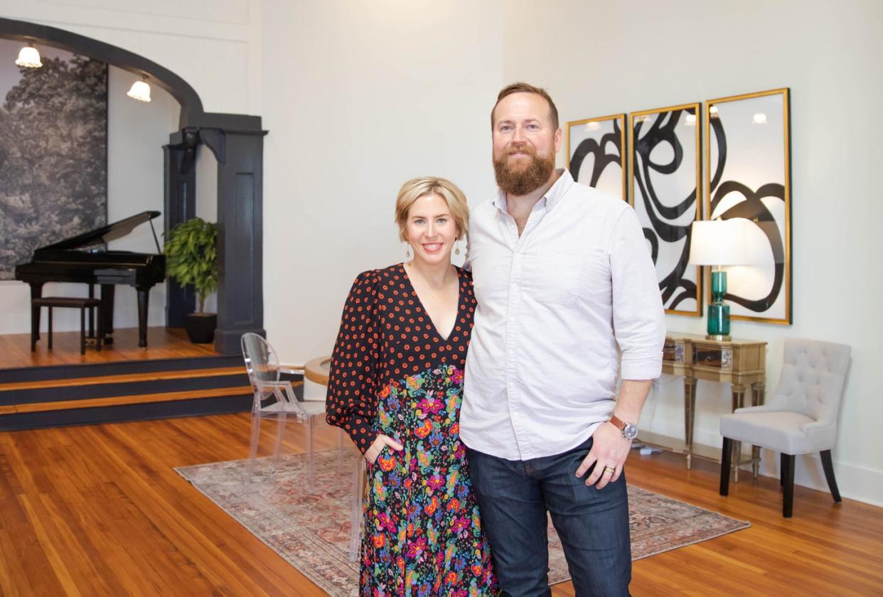 erin and ben in the glamorous living space at the thrower residence on reveal day