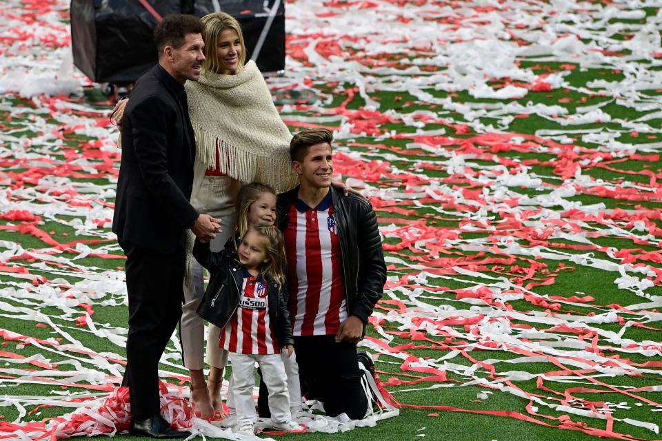 Simeone celebrating with his familyAFP via Getty Images
