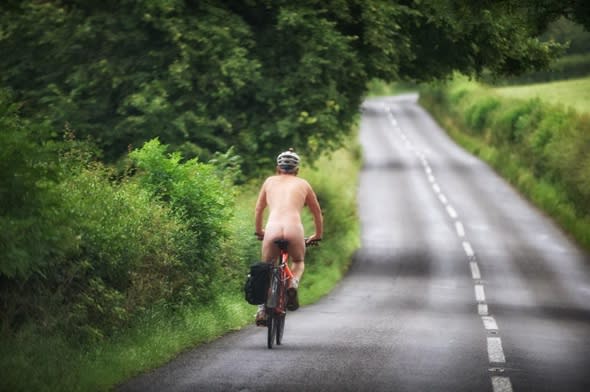 Naked man spotted cycling through UK village 