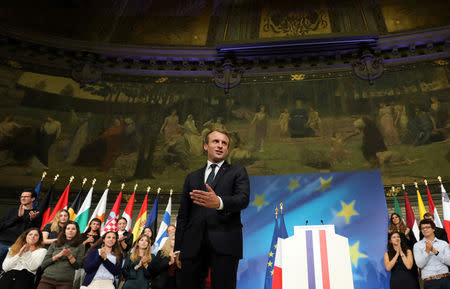 French President Emmanuel Macron reacts after he delivered a speech to set out plans for reforming the European Union at the Sorbonne in Paris, France, September 26, 2017. REUTERS/Ludovic Marin/Pool