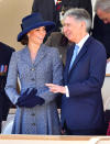 <p>The Duchess re-wore one of her favourite coat dresses for the unveiling of an Iraq and Afghanistan memorial in London. The light blue tweed design is by Michael Kors and was first worn by Kate back in 2014. On this occasion, she paired it with a navy wide-brimmed hat and matching wool gloves.</p><p><i>[Photo: PA]</i> </p>