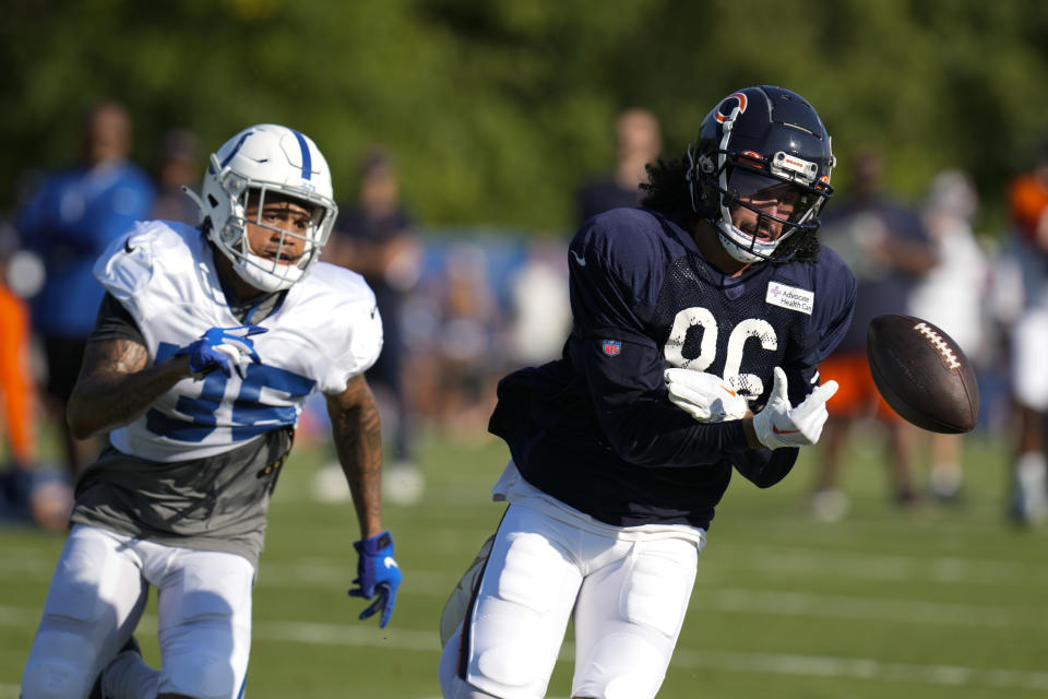 Chicago Bears wide receiver Dante Pettis (86) drops a pass in front of*Indianapolis Colts safety Michael Tutsie (35) during an NFL football joint practice at the Colts' training camp in Westfield, Ind., Wednesday, Aug. 16, 2023. (AP Photo/Michael Conroy)