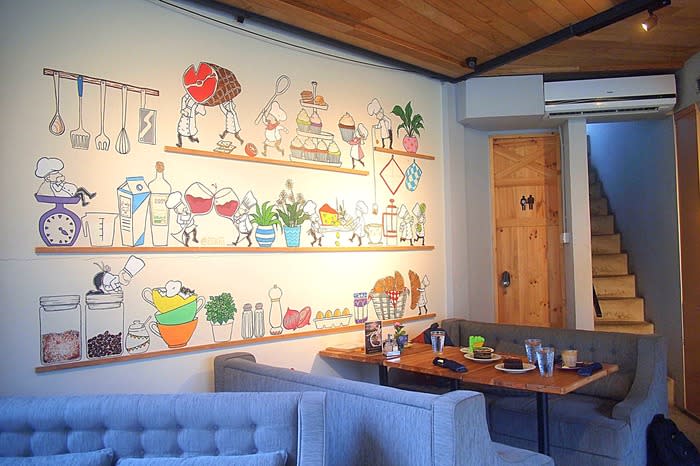 Cute mural: Casadina's interior recalls a Parisian bistro with a rustic touch. A cute mural of tiny chefs preparing meals and a direct view to the pool adds to the laid-back feel of the place.