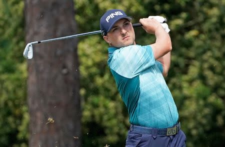 Mar 22, 2019; Palm Harbor, FL, USA; Austin Cook plays his shot from the 13th tee during the second round of the Valspar Championship golf tournament at Innisbrook Resort - Copperhead Course. Mandatory Credit: Jasen Vinlove-USA TODAY Sports