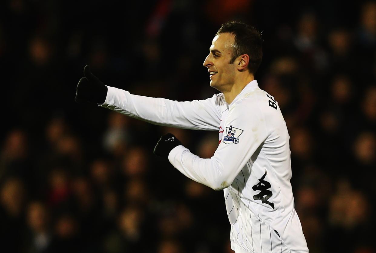 Dimitar Berbatov of Fulham celebrates scoring his second goal during a Barclays Premier League match (Photo by Clive Rose/Getty Images)