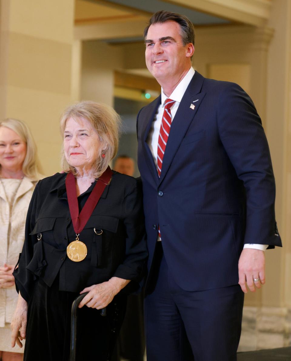 Selby Minner is given the Community Service Award by Gov. Kevin Stitt on Tuesday, Jan. 30, 2024, during the 45th Annual Governor's Arts Awards at the state Capitol in Oklahoma City.