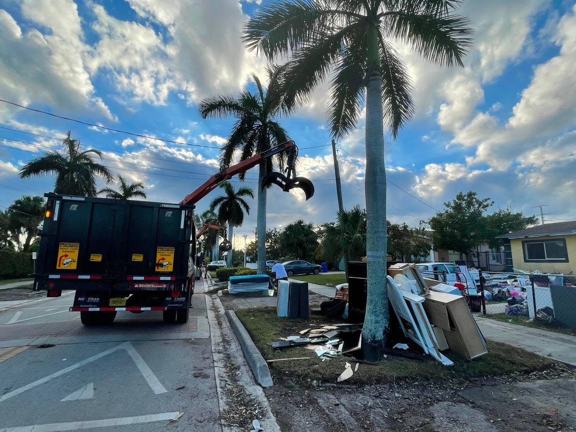 City of Naples trucks pick of water-damaged furniture and mattresses at the east side of Naples’ River Park neighborhood in the morning of Saturday, Oct. 1, 2022. Hurricane Ian’s storm surge caused many single-family homes in the area to flood on Wednesday, Sept. 28.