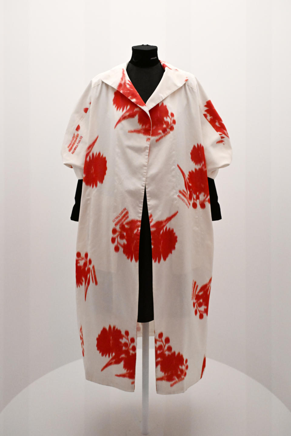 Traditional garment on a mannequin with a floral pattern