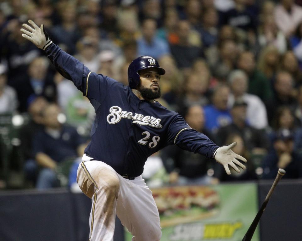 Milwaukee Brewers'  Prince Fielder celebrates an RBI in 2011.