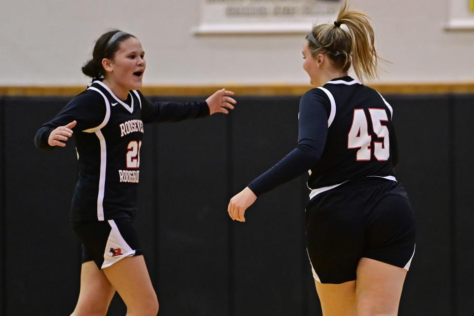 Roosevelt's Lexie Canning, right, is congratulated by Ari Crockett after hitting a three-point shot during the first half of their game against Cuyahoga Falls Wednesday night at Cuyahoga Falls High School.