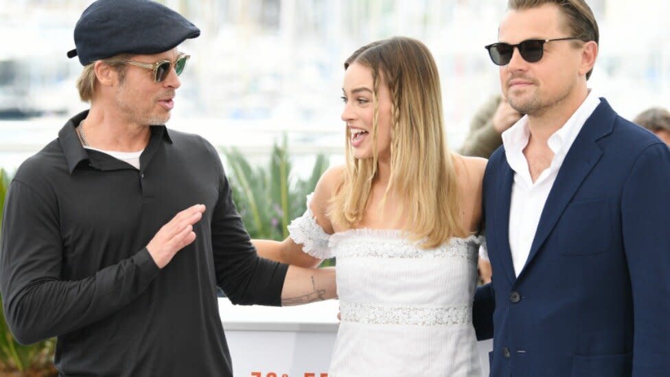 The stars of Quentin Tarantino's new flick, Brad Pitt, Margot Robbie and Leonardo DiCaprio, have been on the receiving end of a very awkward moment. Photo: Getty  