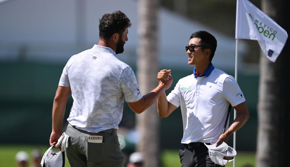   Rahm and Kim shake hands on the 18th green at the Mexico Open 