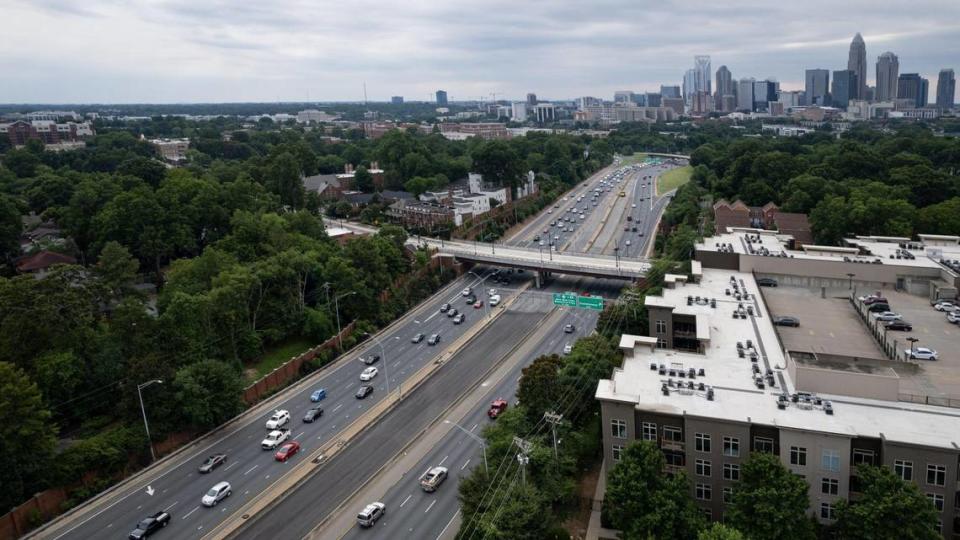 Drivers tool along Independence Boulevard, where long-planned construction for toll lanes has been pushed back four years to 2030, on Tuesday evening, June 28, 2022 in Charlotte, N.C.